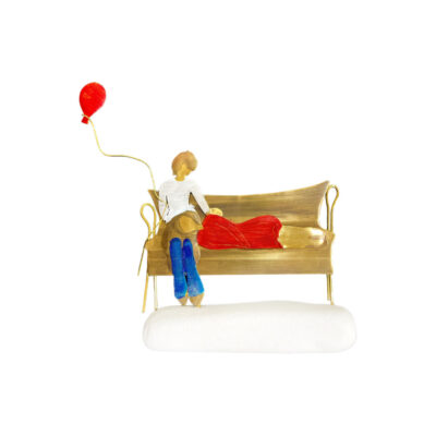 “Ζευγάρι σε παγκάκι με μπαλόνι”
