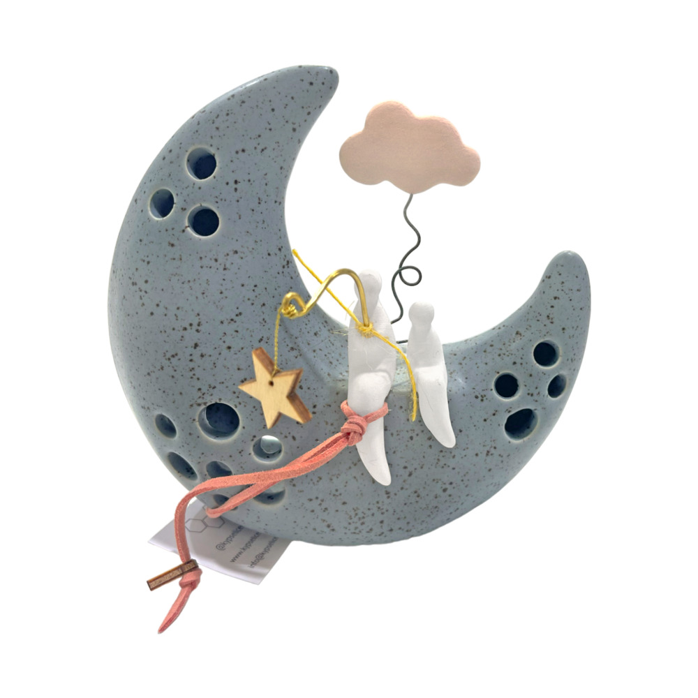 Ζευγάρι ψαρεύοντας απο το φεγγάρι και τα σύννεφα