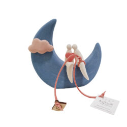 Couple in love from the moon to the clouds