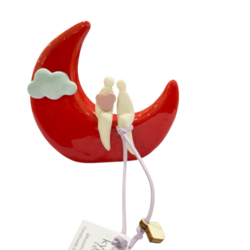 Couple in love from the moon to the clouds