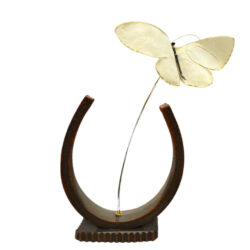 Butterfly on a ceramic horseshoe base
