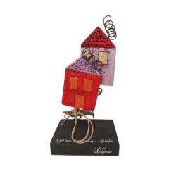 Houses with a chimney on a wooden base