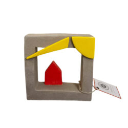 Red house in a gray ceramic frame