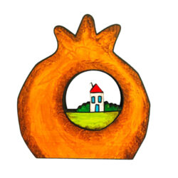 Wooden pomegranate with a house