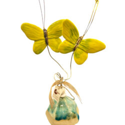 Yellow ceramic butterflies on a base