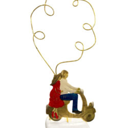 "Ζευγάρι σε μηχανάκι"