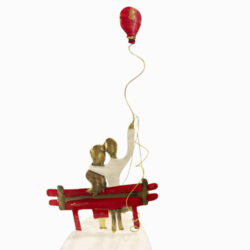 "Ζευγάρι σε μπαλόνι σε παγκάκι"