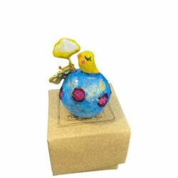 Egg with bird and heart in a box